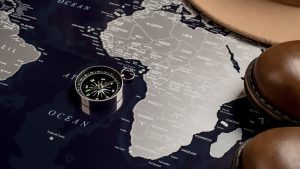 Africa continent map with a compass and shoes symbolizing navigation and exploration1